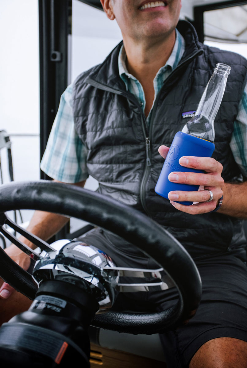 Inventor holds Anchor Drink System while he talks about bringing a product to market