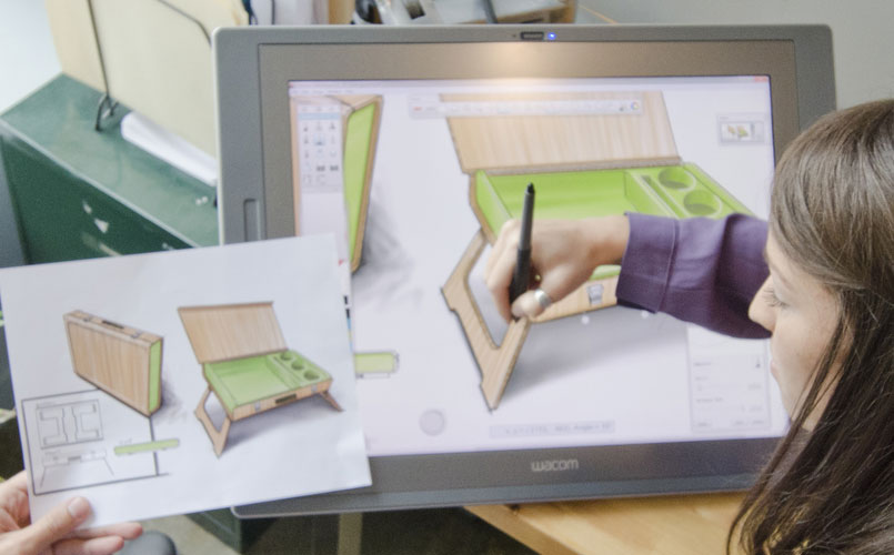 Industrial designer sketches new product idea